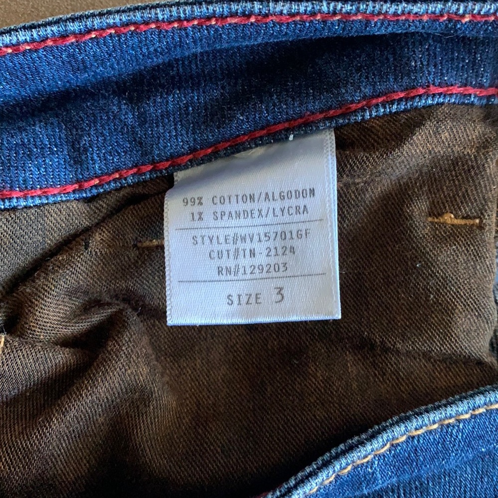 High waisted dark wash denim with slight distressing. - Picture 4 of 5